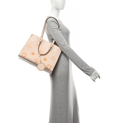 Louis Vuitton Onthego MM Cream Saffron By The Pool Empreinte Monogram Giant image 2