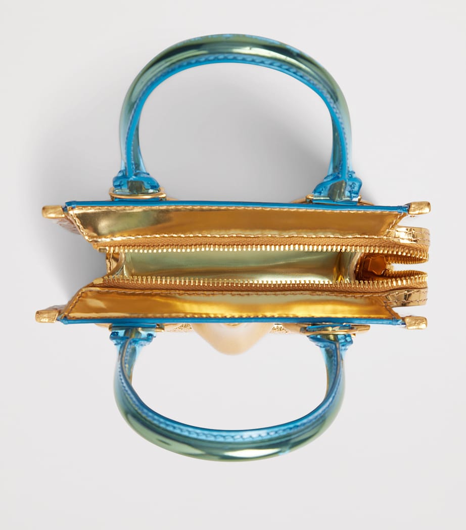 Schiaparelli Mini Vinyl Face Top Handle Bag Gold Blue – PRELOOV